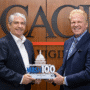 john-mengucci-accepts-2025-wash100-award-from-executive-mosaic